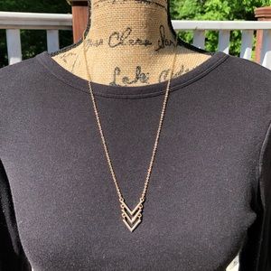 Long gold arrow necklace